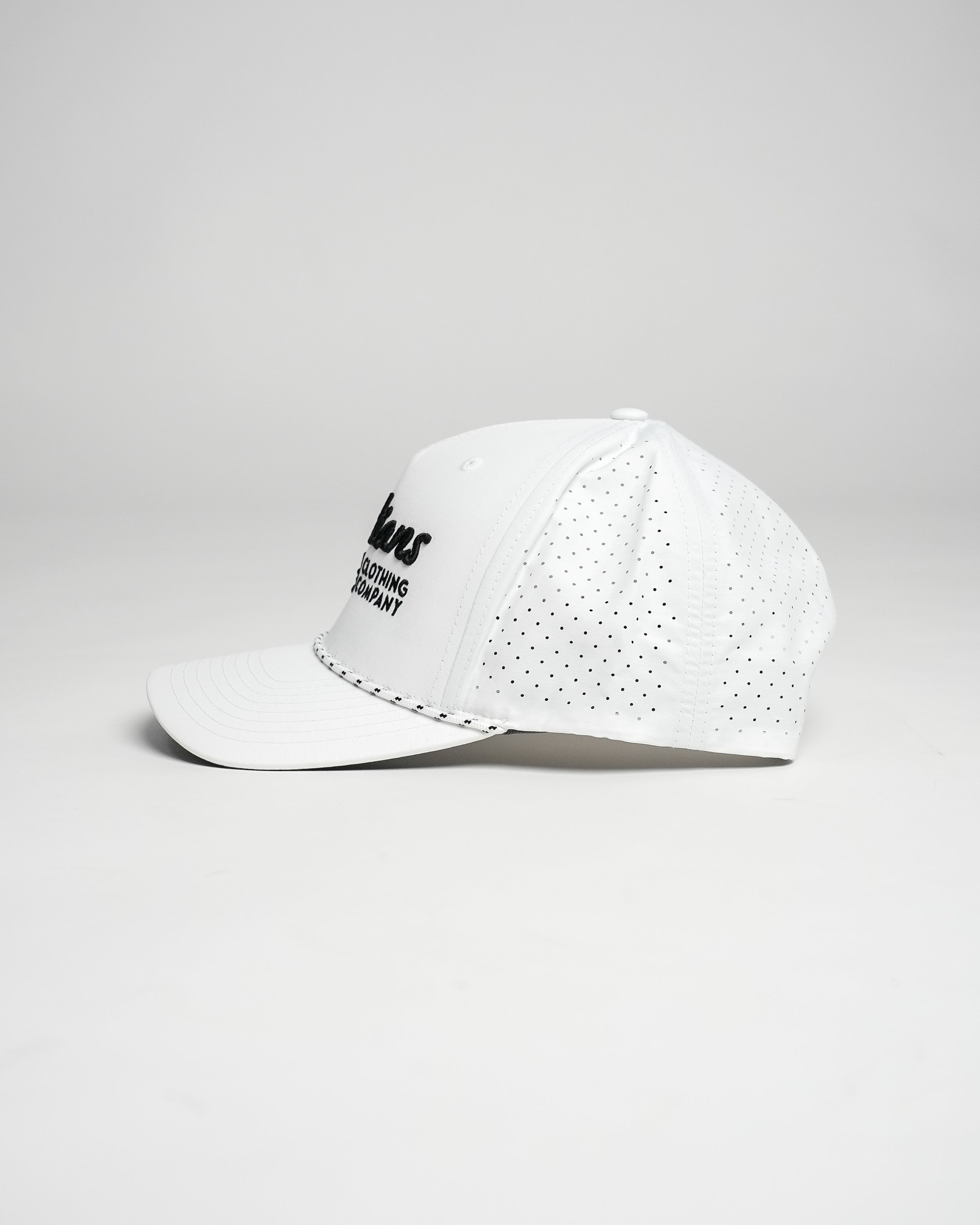 Side view of white Christian golf rope cap with embroidered text.